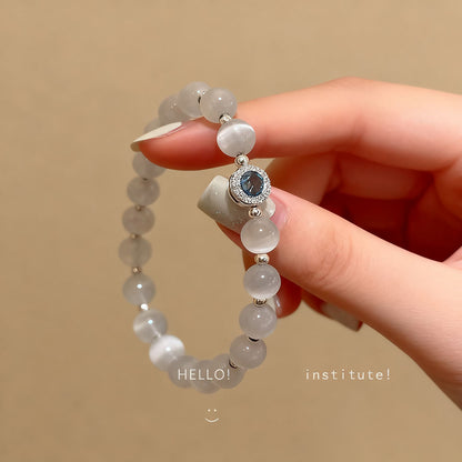 Pulsera de cuentas de ojo de gato y plata aplastada, ligera de lujo, delicada y exclusiva, accesorio de moda para mujeres con estilo, versátil y de alta gama.